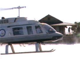 Helicopter lands on beach